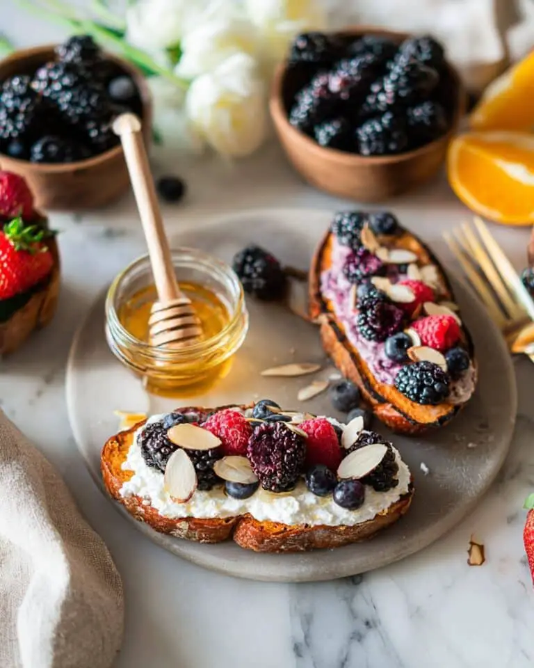 Sweet Potato Toast with Ricotta, Berries, Honey, and Almonds Recipe