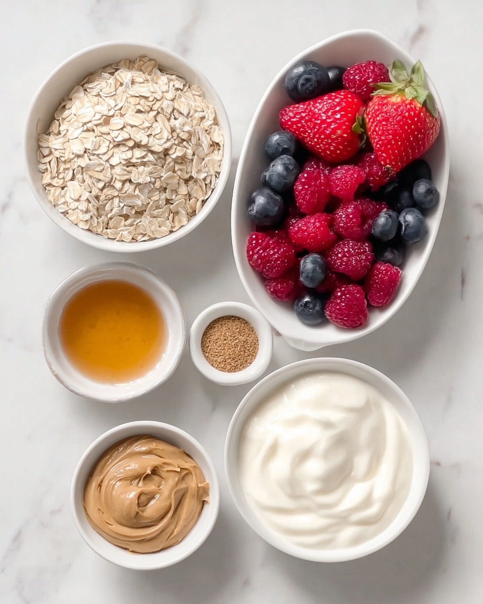 The image shows six separate white bowls and a small white dish arranged neatly on a white marbled surface. The top left bowl is filled with light beige rolled oats with a dry, rough texture. To its right is a smaller bowl with a fine, light brown powder that looks like cinnamon. Below is a bowl of smooth, light brown peanut butter with a creamy texture. Beside it is a small bowl with golden honey, glossy and slightly thick. Below the honey, there is a bowl filled with thick, white yogurt that looks creamy and soft. The small white dish on the left side holds fresh red strawberries, bright red raspberries, and dark blue blueberries, adding a vibrant color contrast to the setup. Photo taken with an iphone --ar 4:5 --v 7
