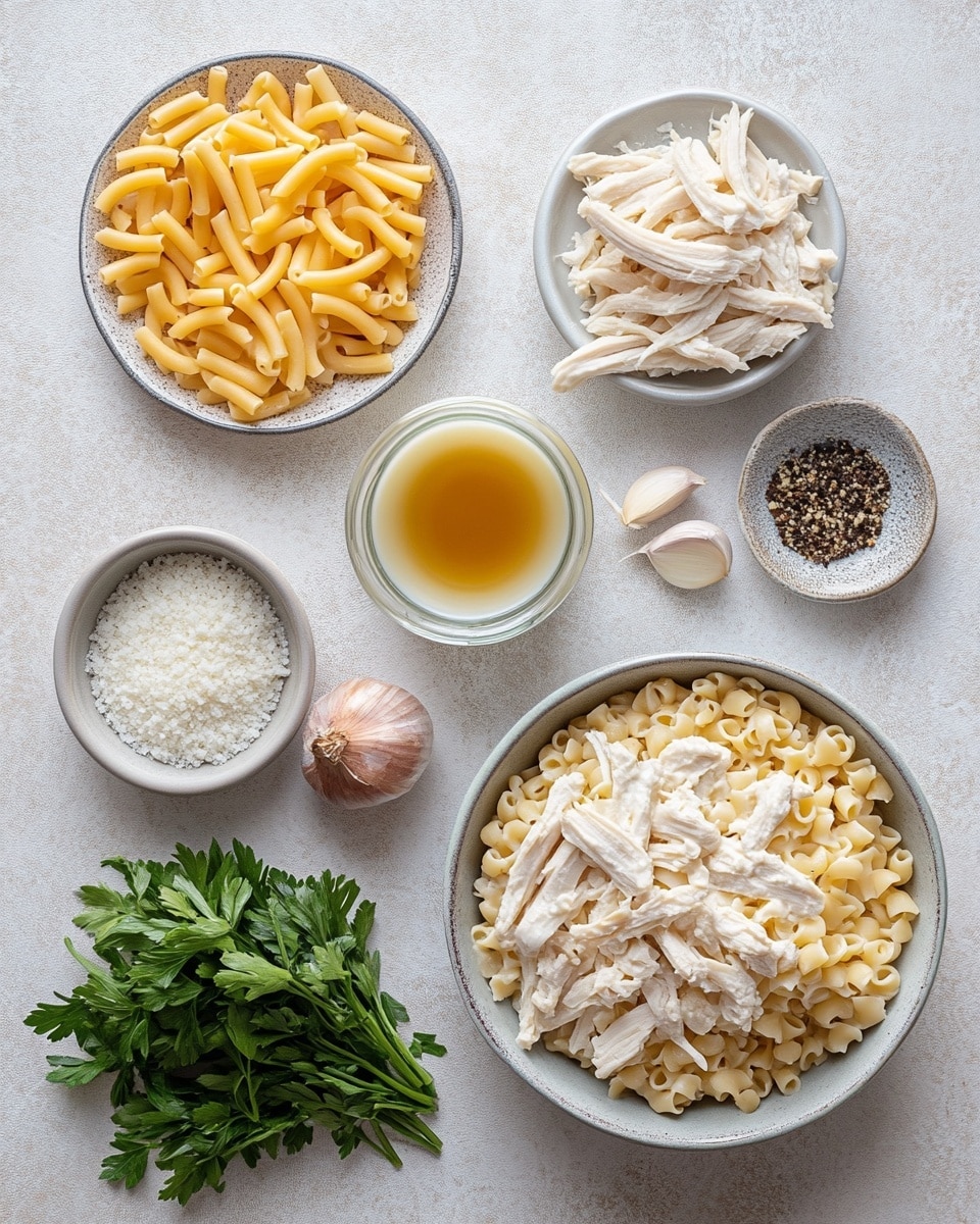 A close-up view of a white bowl filled with baked pasta showing three layers: the bottom layer has soft, pale yellow pasta tubes, the middle layer is shredded, golden-brown cooked chicken pieces, and the top layer has melted, creamy white cheese browned in spots, with small green parsley bits scattered across. The dish looks bubbly and hot, with a white marbled surface beneath the bowl. photo taken with an iphone --ar 4:5 --v 7