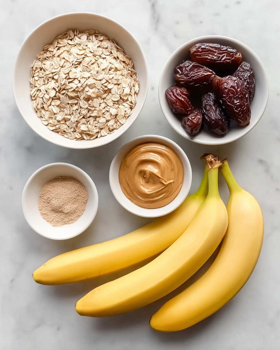 The image shows five ingredients placed on a white marbled surface. There are two whole ripe yellow bananas at the bottom right. To the left of the bananas, there is a small white bowl filled with smooth light brown peanut butter. Above the peanut butter, a larger white bowl contains pale beige rolled oats. To the right of the oats, a medium white bowl holds several dark brown, shiny dates with a wrinkled texture. A small white bowl filled halfway with a mix of white and light brown fine powders (salt and cinnamon) is placed between the dates and bananas. photo taken with an iphone --ar 4:5 --v 7