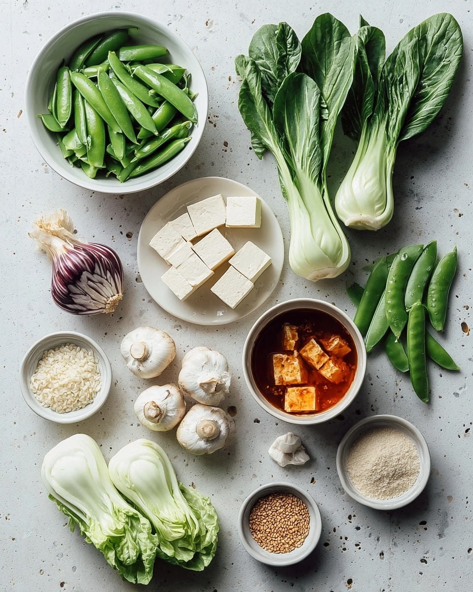 This image shows an arrangement of fresh ingredients neatly placed on a white marbled surface. At the top left, there is a white bowl filled with bright green snap peas, some opened to show peas inside. To the right, there are two fresh bunches of bok choy with dark green leaves and white stems. Below the snap peas, there is a whole bulb of garlic with purple stripes beside a small pile of green leaves. Centered are five pale, rectangular pieces of tofu. To the right of the tofu, nine plump, white dumplings are grouped together. Below the tofu, a white bowl holds a reddish broth with tofu pieces floating inside. Surrounding this bowl, there are three smaller white bowls: one with small white grains, one with tan seeds, and one with light brown grains. At the bottom left, three white mushrooms sit next to a bulb of bok choy and some pale green napa cabbage leaves. The overall presentation is clean and organized with fresh, natural colors. Photo taken with an iphone --ar 4:5 --v 7