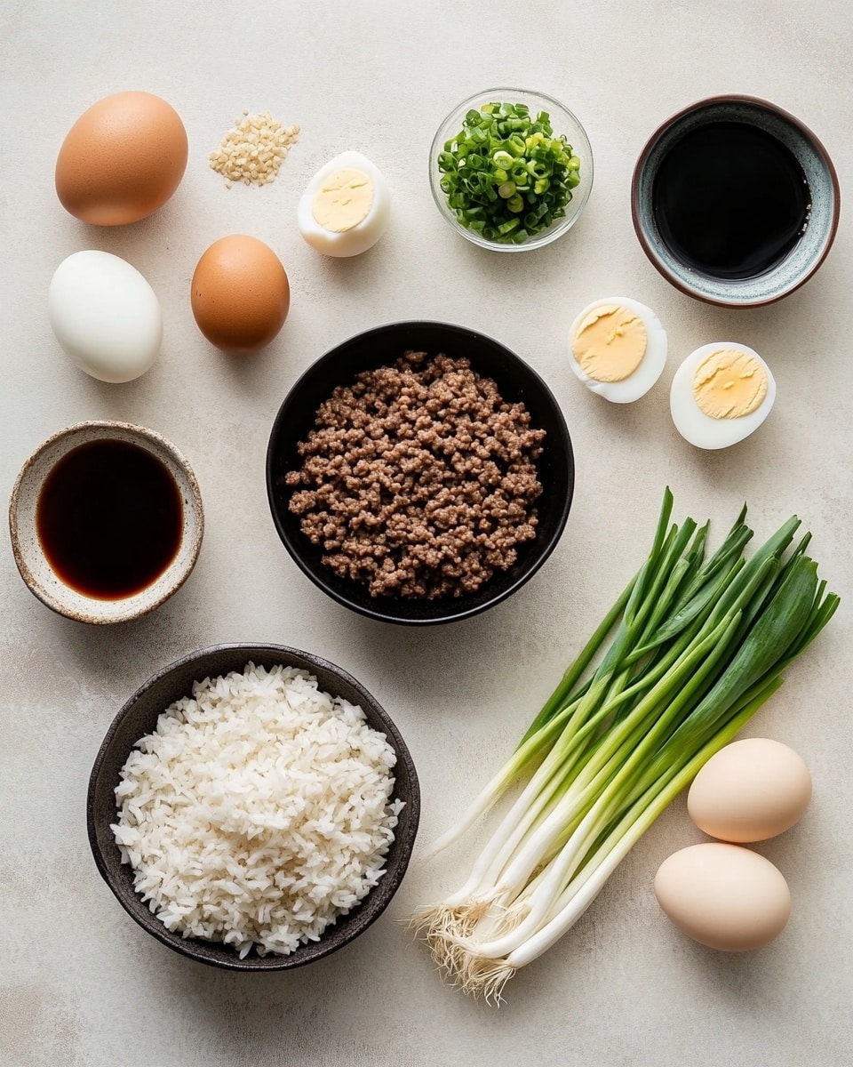 A white bowl filled with three main parts: on the left side is a layer of cooked ground beef mixed with small bits of cooked onions, sprinkled with white sesame seeds and finely chopped green onions; on the right side is a serving of fluffy white rice topped with some green onion pieces; at the bottom right, there are two halves of a soft-boiled egg with bright yellow runny yolks and smooth white edges. The bowl sits on a gray cloth napkin on a dark wooden surface, with a spoon to the right and a small white bowl of sesame seeds visible in the top left corner. Photo taken with an iphone --ar 4:5 --v 7
